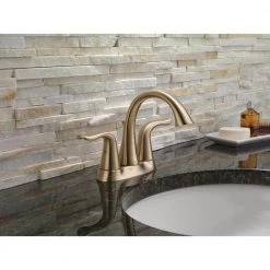 Delta Lahara 4 in. Centerset 2-Handle Bathroom Faucet with Metal Drain Assembly in Champagne Bronze -Bathroom Faucets Store champagne bronze delta centerset bathroom faucets 2538 czmpu dst fa 1000