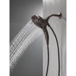 Delta In2ition Two-in-One 5-Spray 6 in. Dual Wall Mount Fixed and Handheld Shower Head in Venetian Bronze -Bathroom Faucets Store venetian bronze delta dual shower heads 75505rb c3 1000